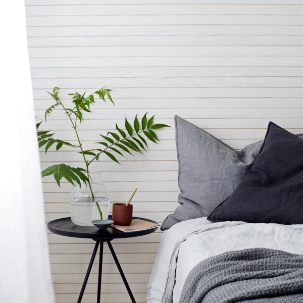 The KOO2 decorative panel on the bedroom wall creates a calm and modern look. Horizontal paneling and a single false groove add depth and subtle texture to the space, enhancing the natural beauty of the wood. The Finnish design by Kari Lappalainen ensures a durable and timeless interior solution.